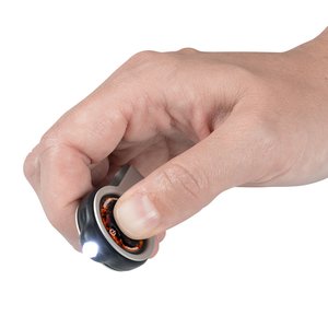 Additional Image 1 - a hand holding a black object