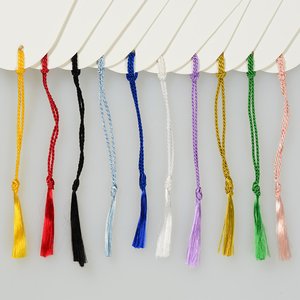 Additional Image 1 - a group of colorful ribbons from a white wall