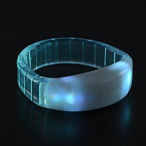 Additional Image 3 - a clear bracelet on a black surface
