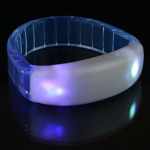 Additional Image 3 - a white bracelet on a black surface