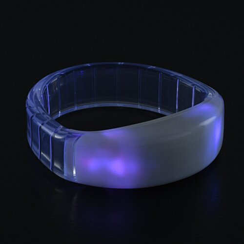 Additional Image 7 - a clear plastic ring with purple light