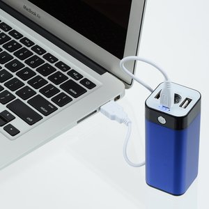 Additional Image 1 - a blue battery next to a laptop