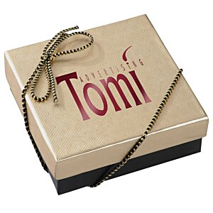 Additional Image 2 - a box with a ribbon tied to it