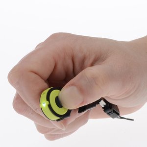 Additional Image 2 - a hand holding a black and yellow ring