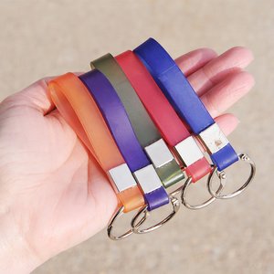 Additional Image 2 - a hand holding several colorful keys