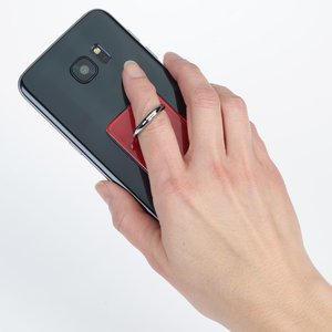 Additional Image 2 - a hand holding a remote control