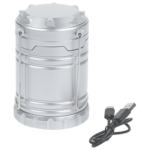 Additional Image 1 - a silver cylinder with a black cord