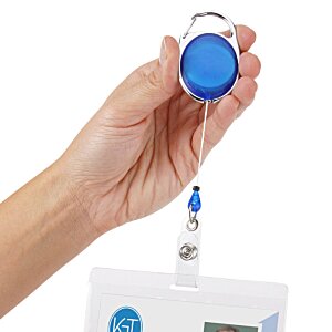 Additional Image 1 - a hand holding a blue bottle