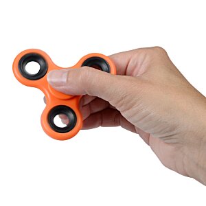 Additional Image 1 - a hand holding a fidget spinner