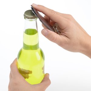 Additional Image 1 - a hand holding a bottle of liquid