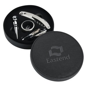 Additional Image 1 - a black circular object with a screwdriver and a knife