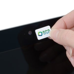 Additional Image 1 - a person's hand holding a small white sticker