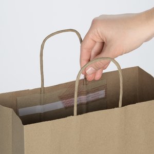 Additional Image 2 - a hand holding a brown bag