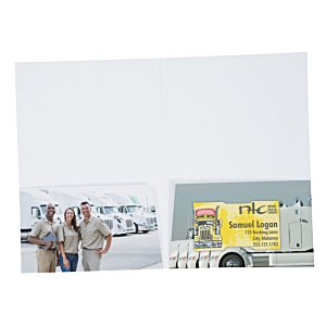 Additional Image 2 - a group of people standing in front of a yellow truck