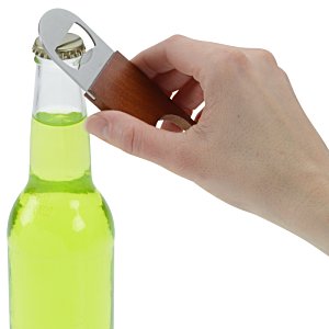 Additional Image 1 - a hand holding a bottle