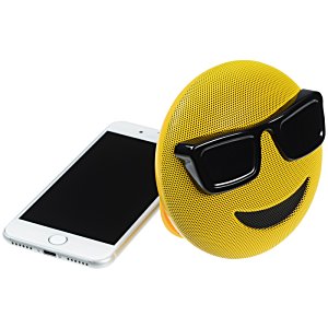 Additional Image 3 - a yellow ball with sunglasses on it next to a cell phone