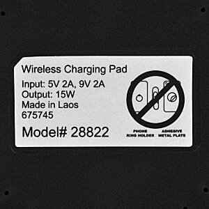 Additional Image 6 - a white and black label with a circle and a black circle