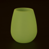 a green vase on a black background