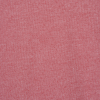 a pink fabric with a white spot