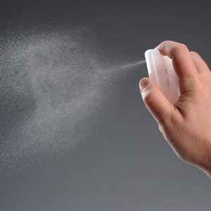 Additional Image 3 - a person spraying a white object