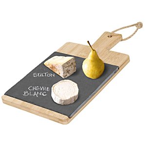 Additional Image 2 - a cheese board with cheese and pear on it