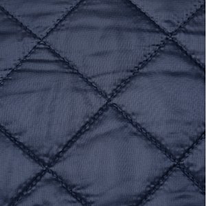 Additional Image 2 - a close up of a blue quilted surface