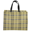 a yellow and black plaid bag