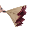 Additional Image 1 - a hand holding a brown umbrella
