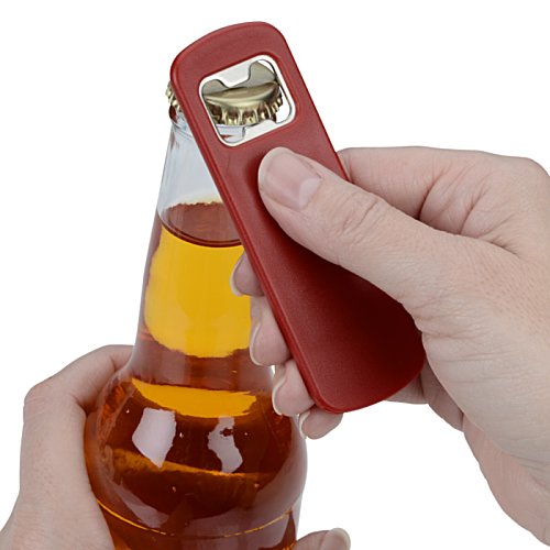 Additional Image 1 - a hand holding a bottle opener