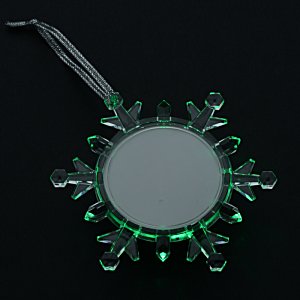 Additional Image 1 - a snowflake shaped pan with green lights