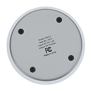 Additional Image 2 - a white circular object with black holes