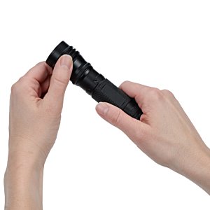 Additional Image 1 - a person holding a remote control