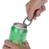 a hand holding a can