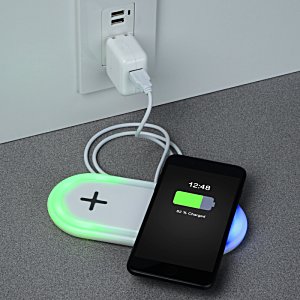 Additional Image 4 - a cell phone charging on a charger
