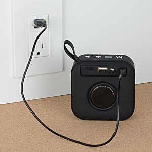 Additional Image 4 - a black square object with a cord plugged into a wall