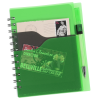 a green notebook with a spiral bound cover