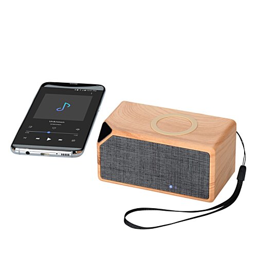 Additional Image 2 - a cell phone next to a speaker