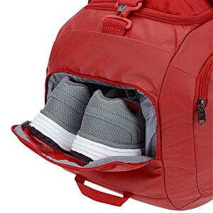 Additional Image 3 - a red backpack with a few grey objects inside