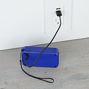 Additional Image 4 - a blue rectangle with a black cord plugged into a wall