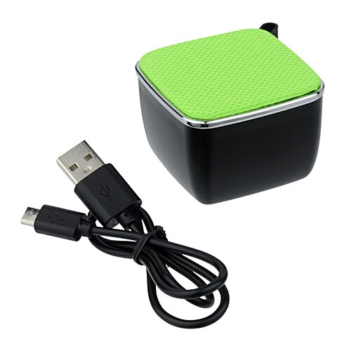 Additional Image 1 - a black and green cube with a black cord