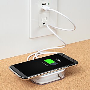 Additional Image 1 - a cell phone charging on a charger
