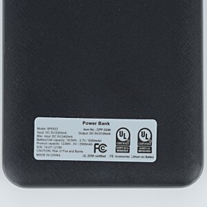 Additional Image 6 - a black rectangular object with white label