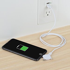 Additional Image 1 - a phone charging on a table