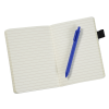 a pen on a notebook