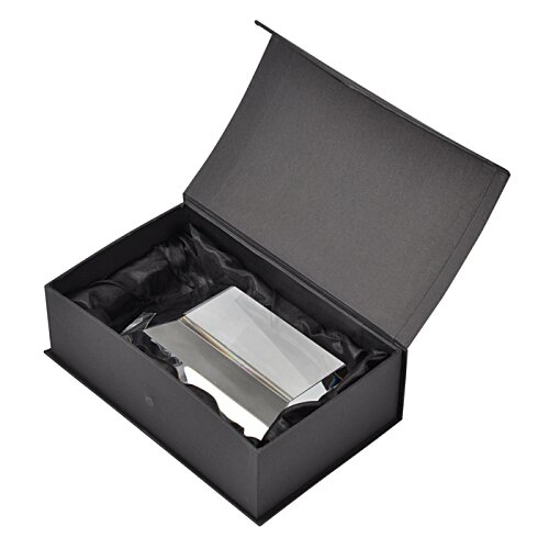 Additional Image 1 - a black box with a silver object inside