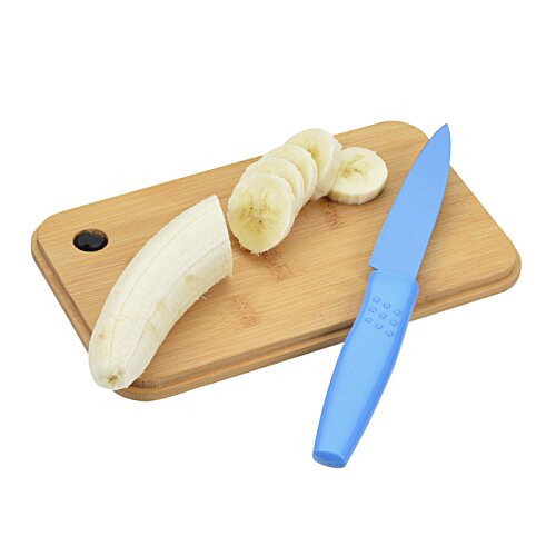 Additional Image 1 - a knife and a banana on a cutting board