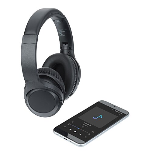 Additional Image 4 - a black headphones next to a cell phone