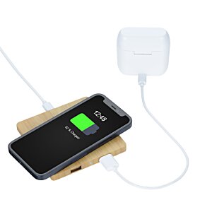 Additional Image 3 - a cell phone on a charging pad