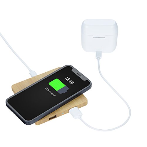 Additional Image 3 - a cell phone on a charging pad