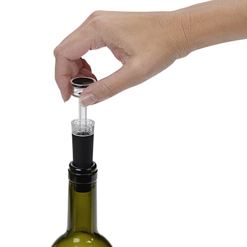 Additional Image 3 - a hand holding a bottle